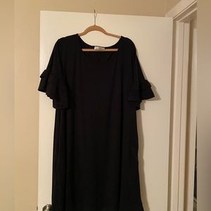 Black knee length dress with pockets